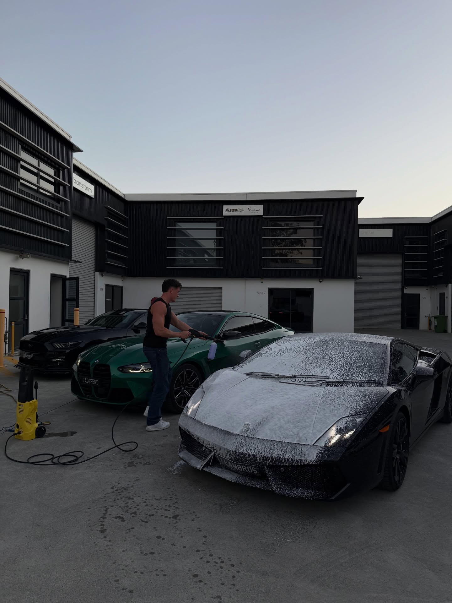Jake washing the Lamborghini